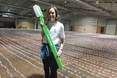 Guinness World Record toothbrush event volunteer photo, 2019